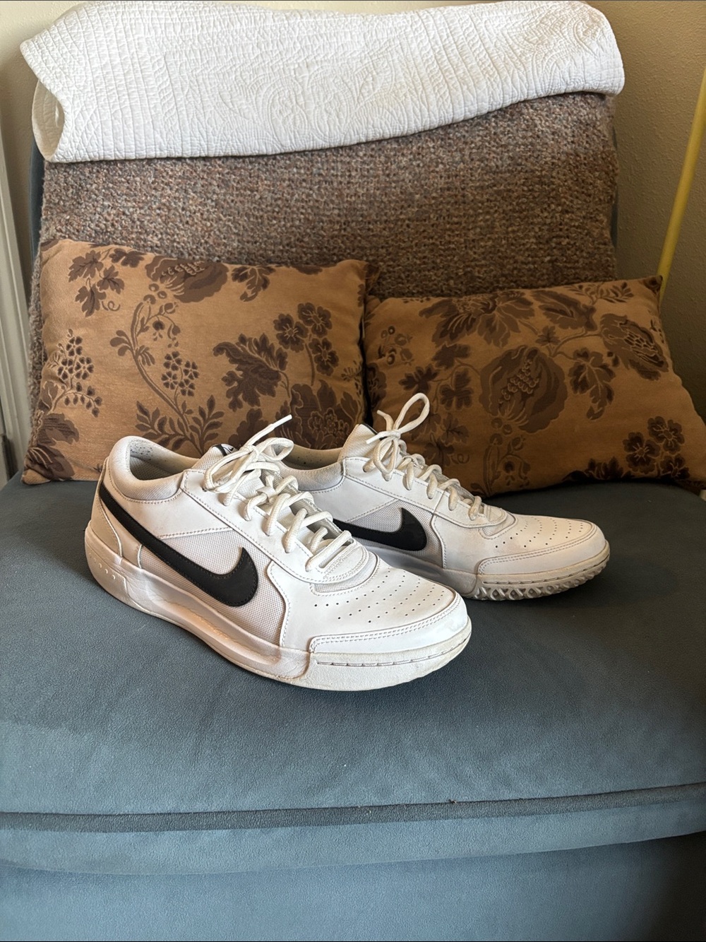Nike White Sneakers with Black Swoosh Accent